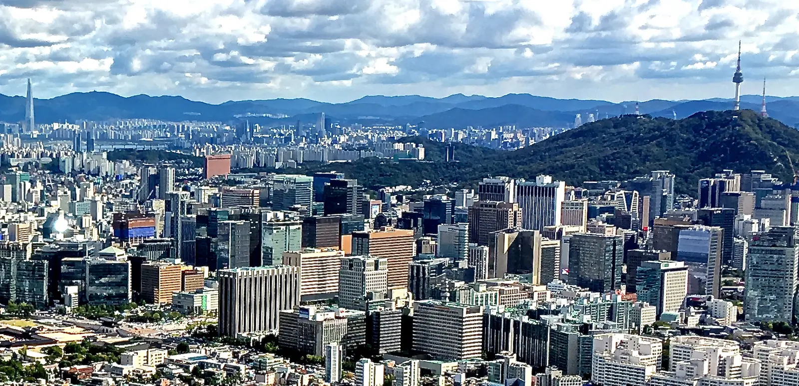 Seoul skyline seen from a height with Lotte World Tower and Namsan Tower